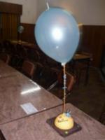 Diseņos exclusivos en souvenirs con globos y centros de mesa para fiestas.